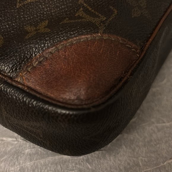 LOUIS VUITTON Monogram Marly
Dragonne GM Clutch Bag
Auth with COA - Picture 7 of 15